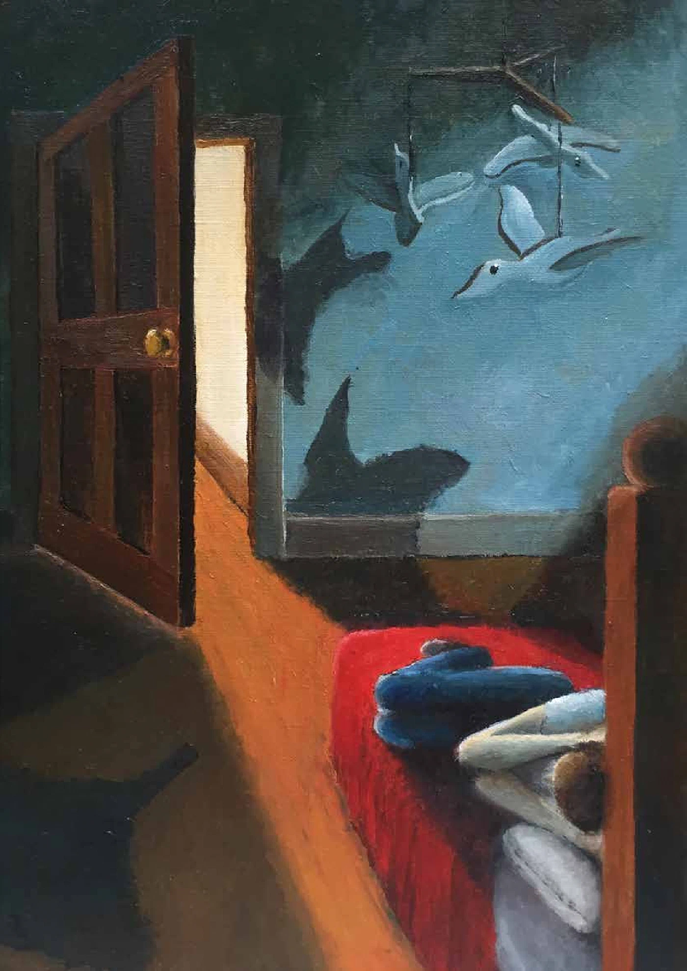 A child curled on a red bed in a darkened room, a mobile of birds turning above.